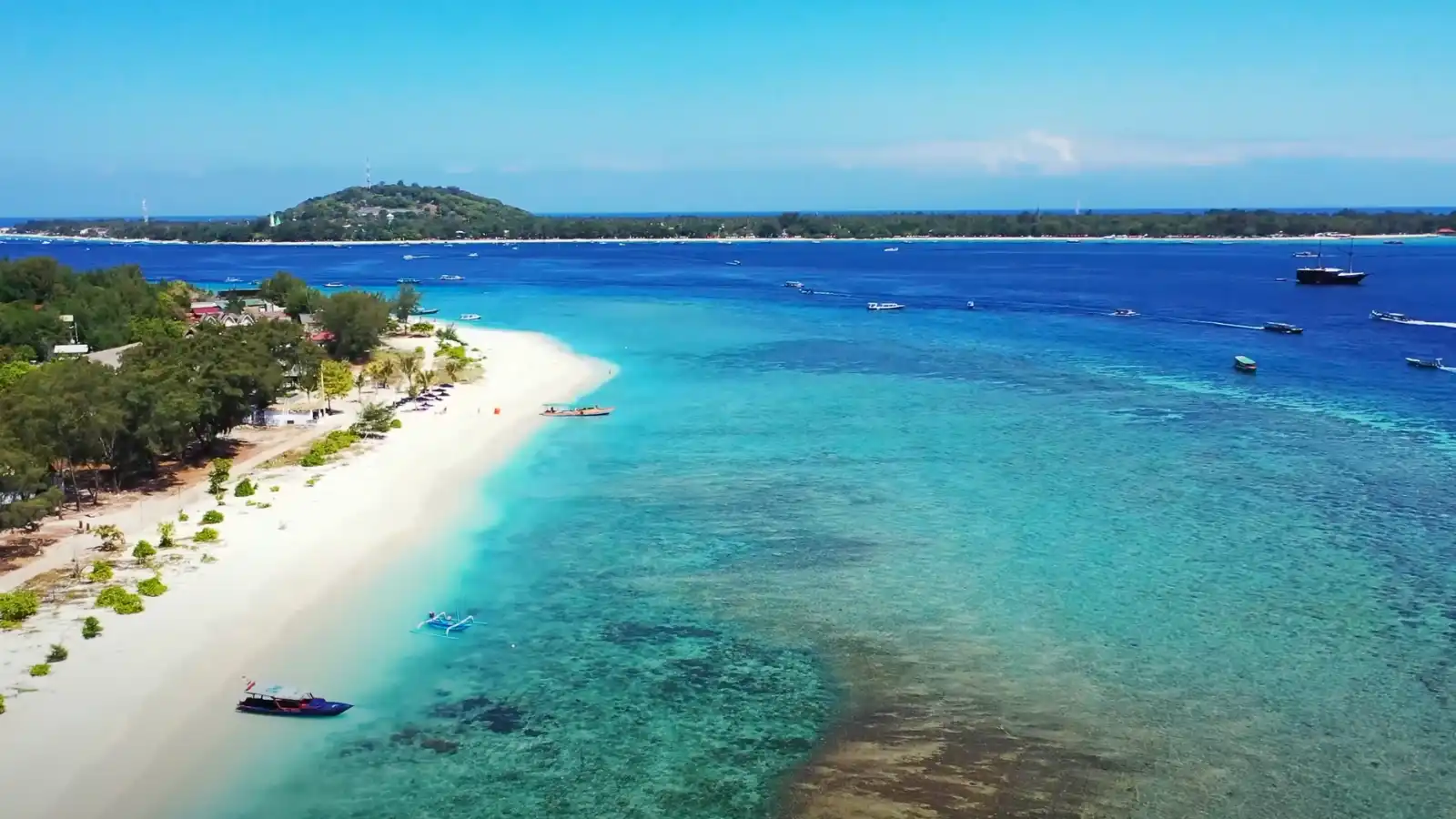 Aerial view of Fiji islands with turquoise lagoons, coral reefs, and tropical beaches seen from above