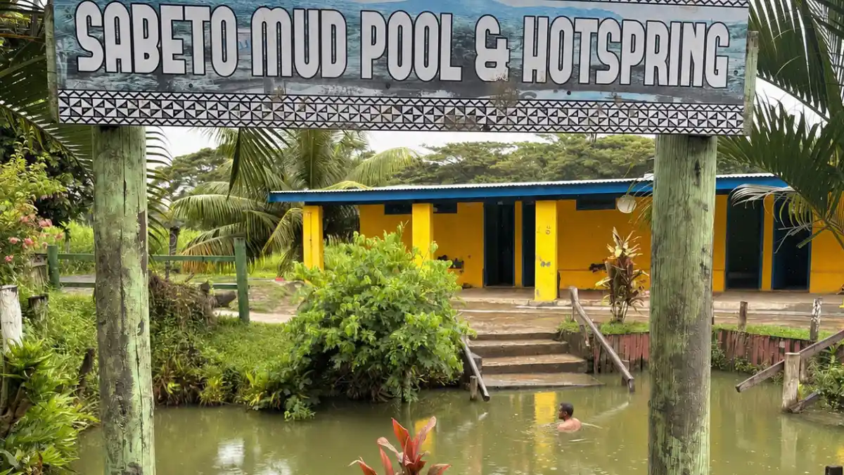 Visitors relaxing in the designated warm pools at Sabeto Hot Spring and Mudpool.