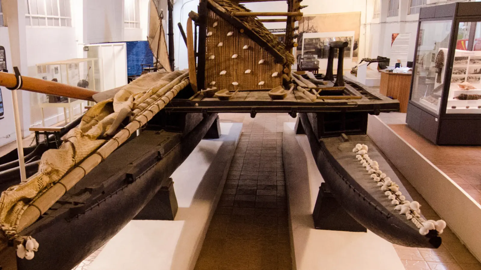 Traditional 13-meter double-hulled drua sailing canoe on display at the Fiji Museum in Suva