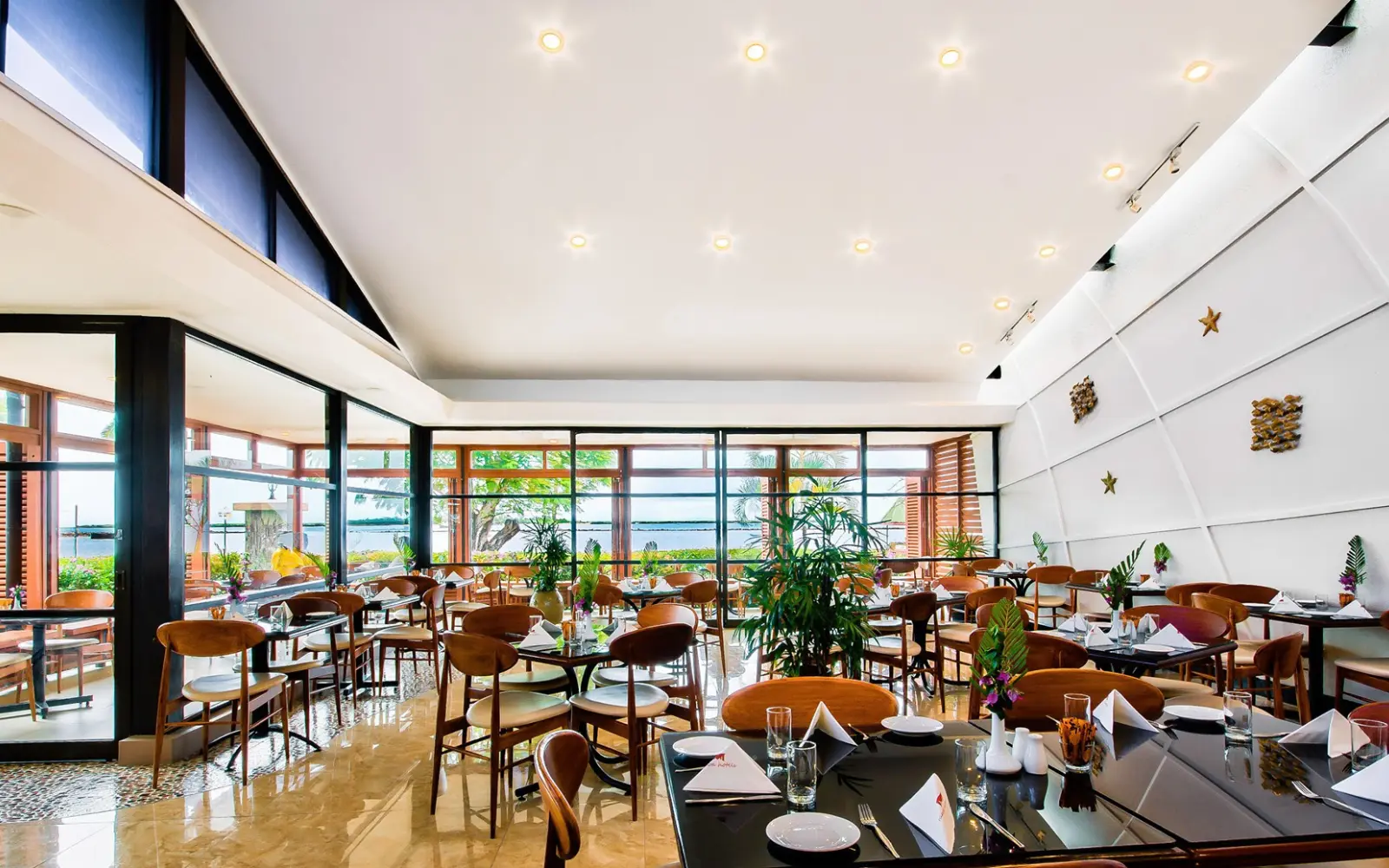 Fins Restaurant Lautoka waterfront dining with panoramic harbor views at Tanoa Waterfront Hotel on Marine Drive