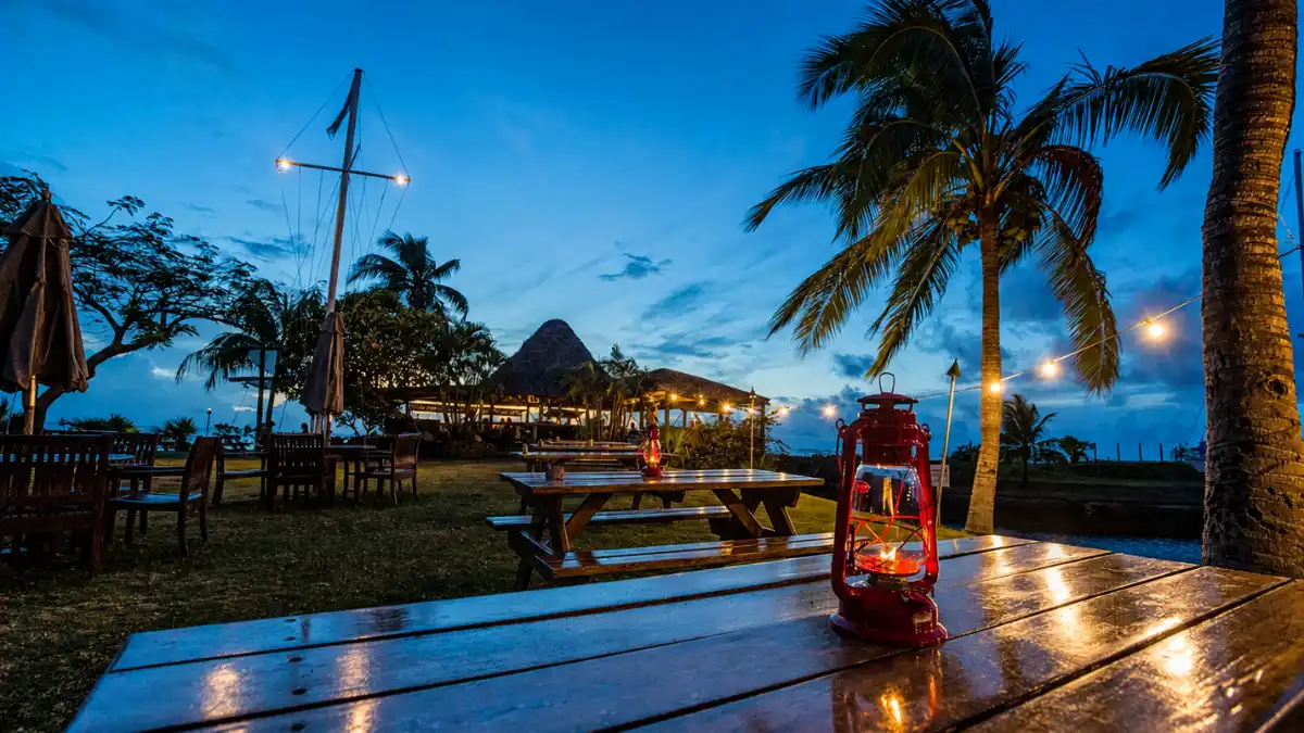 The Boatshed Restaurant at Vuda Marina with yachts and sunset light over the water.