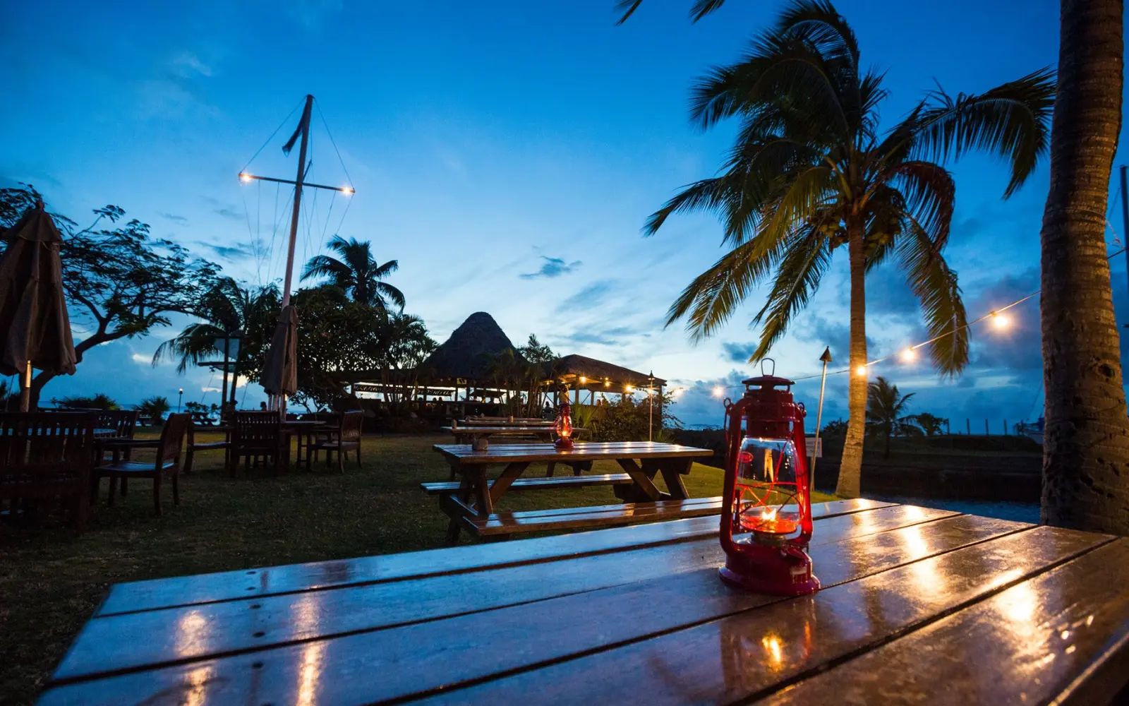 Dining tables at The Boatshed Restaurant and Bar overlooking the marina near Nadi, Fiji