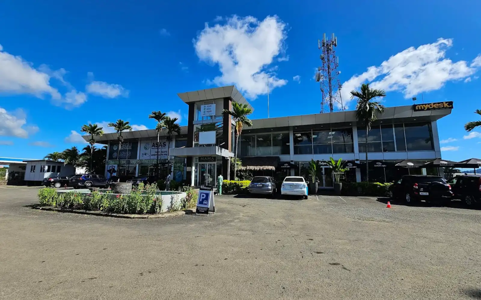 The modern exterior of The Coffee Hub cafe in Nadi, Fiji, showcasing its eco-conscious and stylish design.