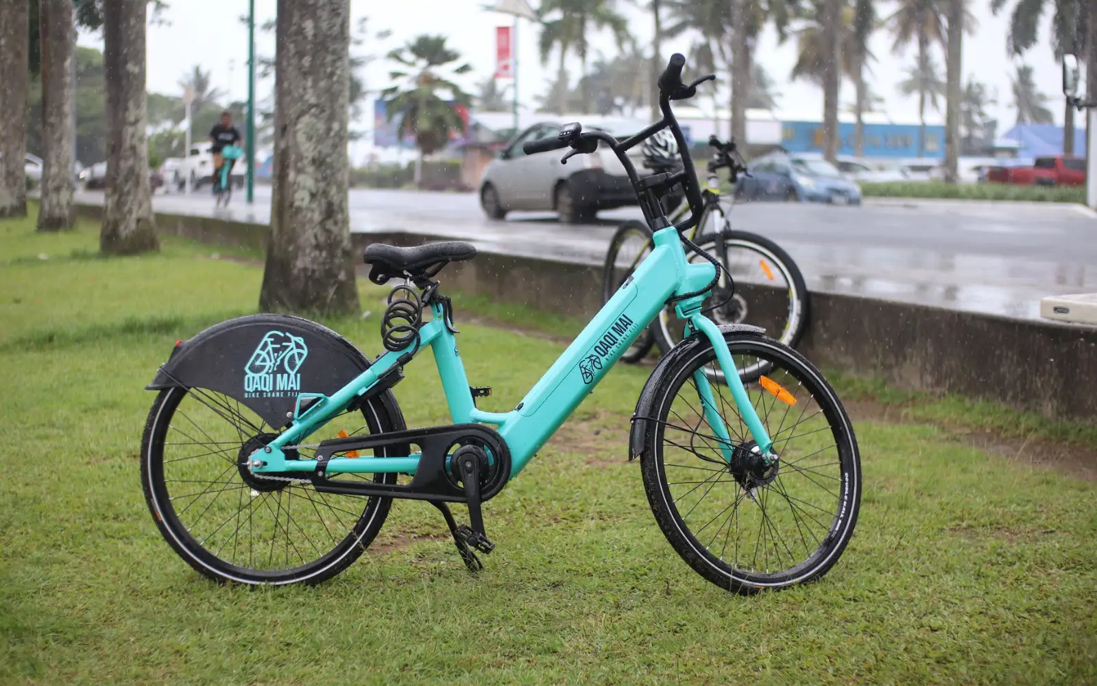 A rental bicycle parked on a path in Nadi, Fiji, representing an eco-friendly transport option for exploring the town sustainably.