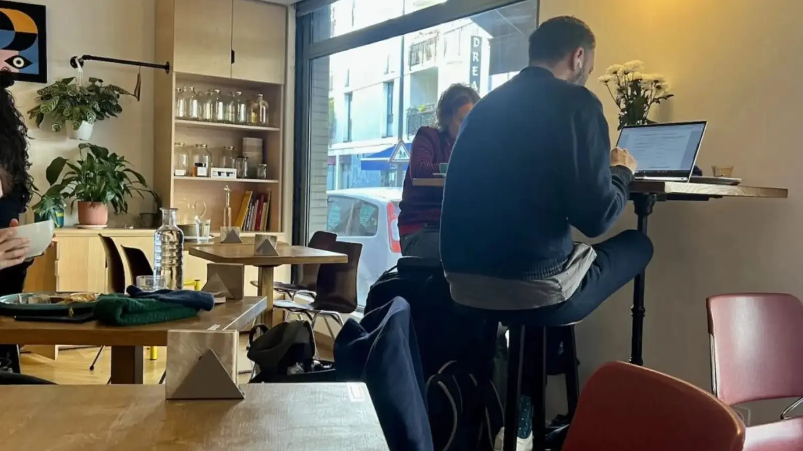 Tourists using free Wi-Fi internet at modern café in Sigatoka Fiji Coral Coast with laptops and mobile devices