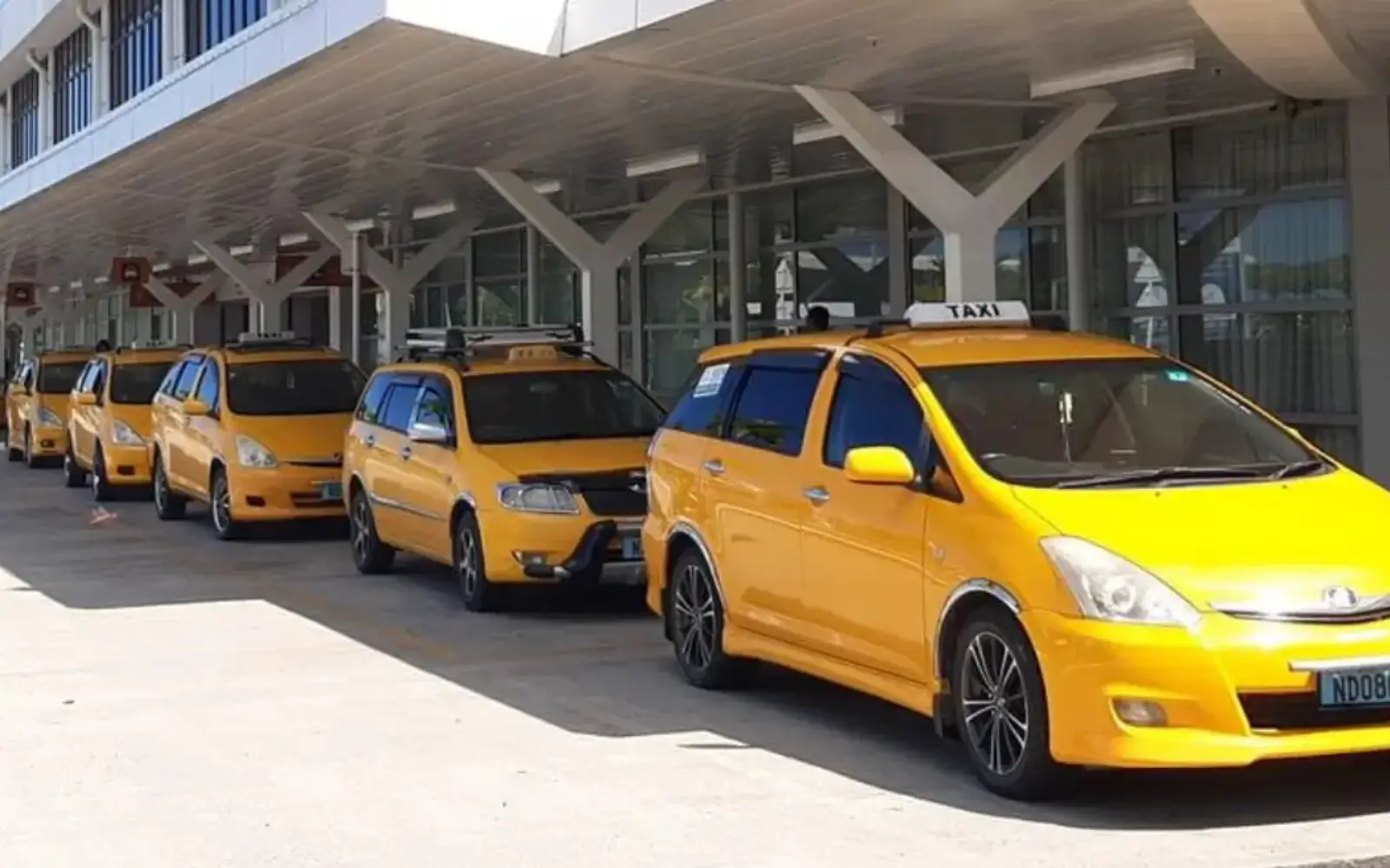 A taxi on a street in Suva, Fiji, ready for passenger transport.
