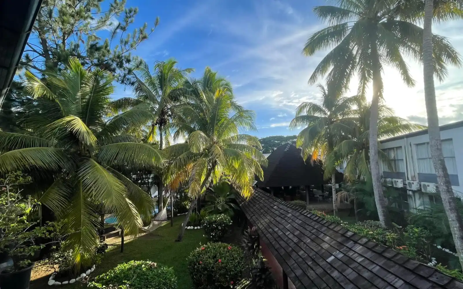 The inviting exterior of Capricorn International Hotel in Nadi, Fiji, showcasing its well-maintained facade and welcoming ambiance.