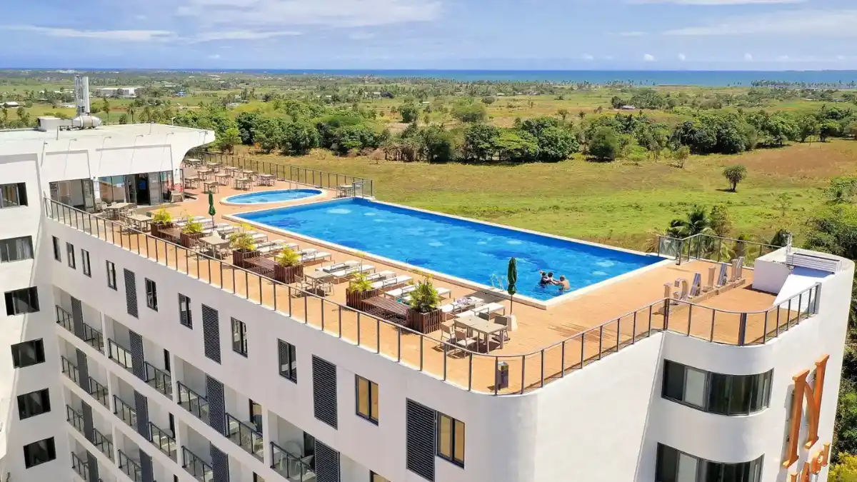 Rooftop infinity pool at Nalagi Hotel overlooking Nadi and the surrounding mountains.