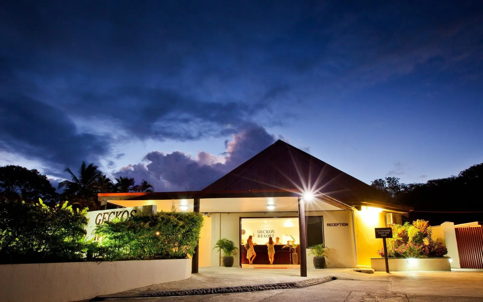 Garden view of Gecko's Resort with traditional Fijian architecture
