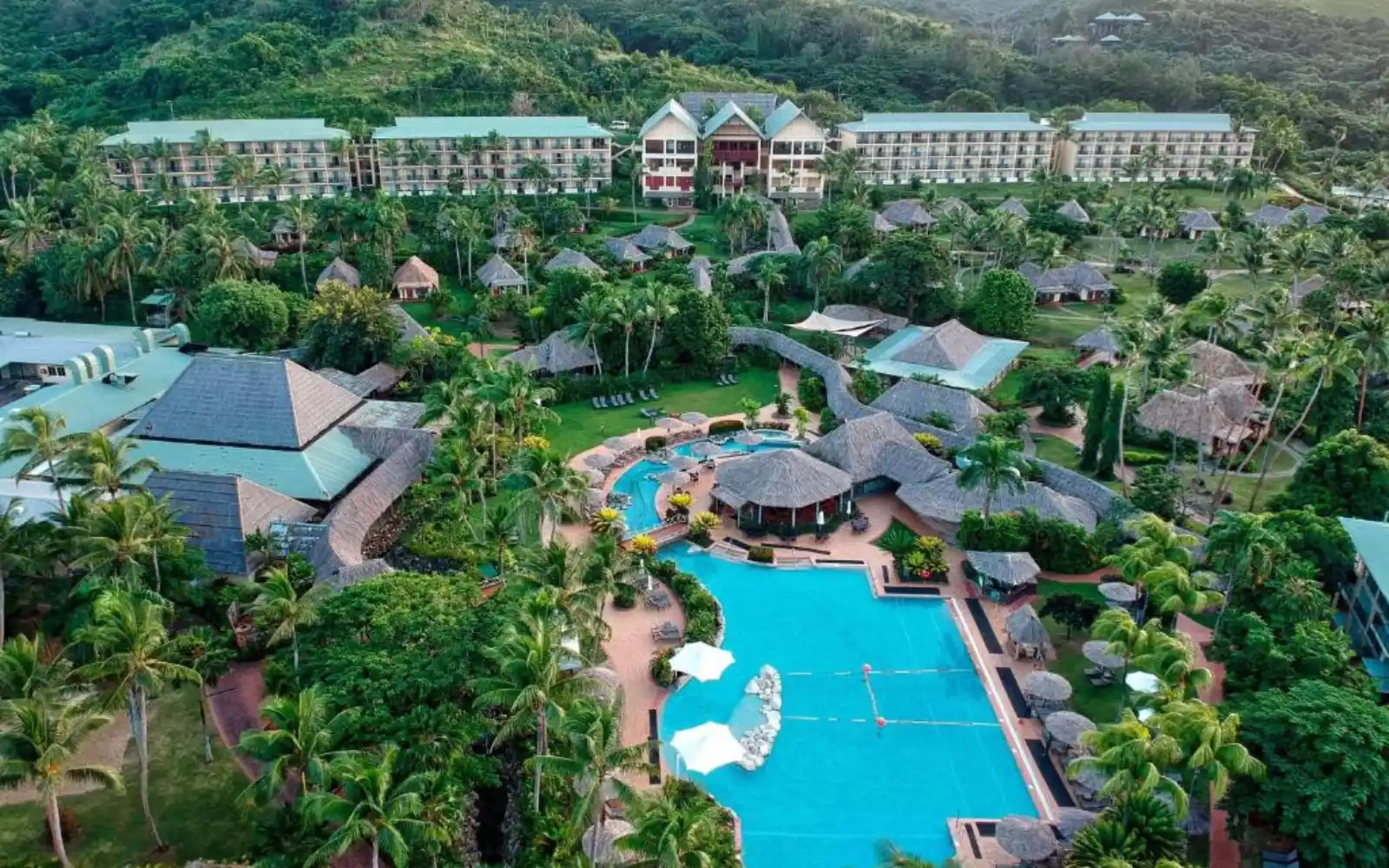 Aerial view of Outrigger Fiji Beach Resort on the Coral Coast with lush gardens and beachfront bures