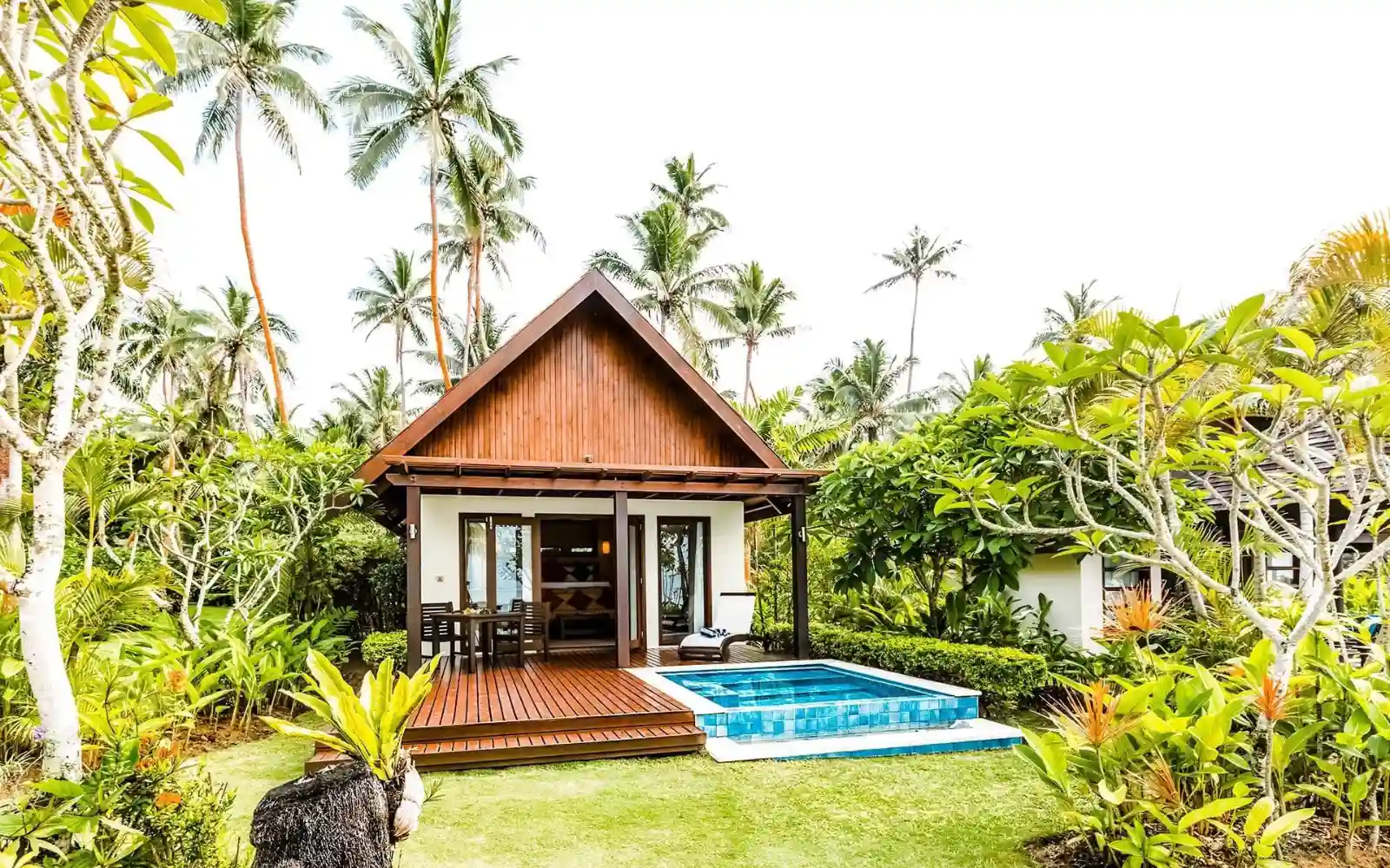 Beachfront bure at Tambua Sands Eco Resort with turquoise lagoon