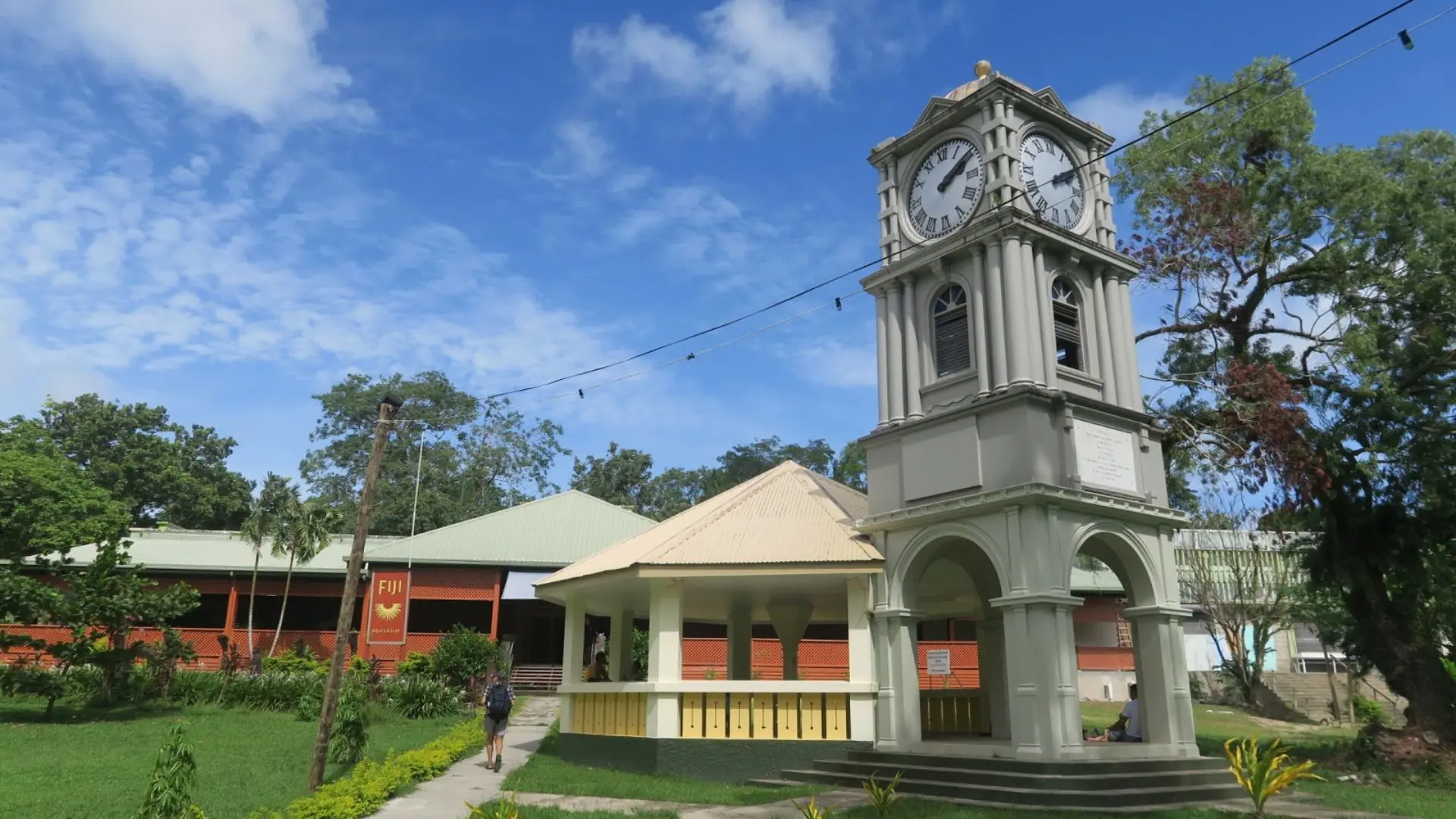 Historic colonial building of Fiji Museum surrounded by lush Thurston Gardens with traditional Fijian artifacts displayed