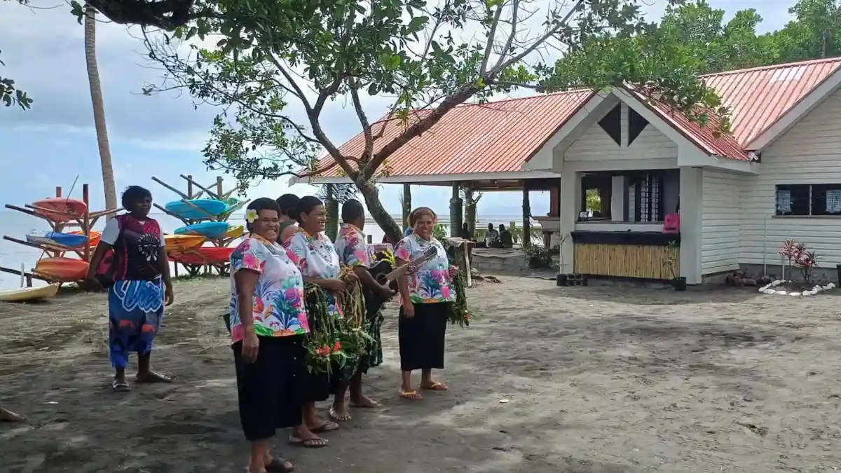 Traditional Fijian bures at Natalei Ecolodge overlooking the ocean, offering a sustainable and authentic Fijian experience.