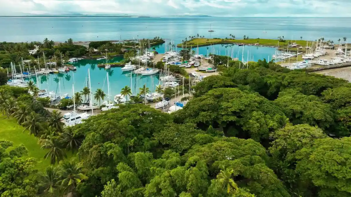 Aerial view of Vuda Marina yacht basins, hardstand and tropical coast on Viti Levu